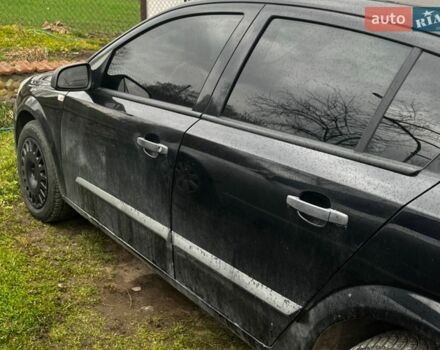 Черный Опель Астра, объемом двигателя 1.42 л и пробегом 190 тыс. км за 4700 $, фото 1 на Automoto.ua