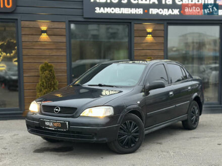 Черный Опель Астра, объемом двигателя 1.4 л и пробегом 102 тыс. км за 3600 $, фото 1 на Automoto.ua