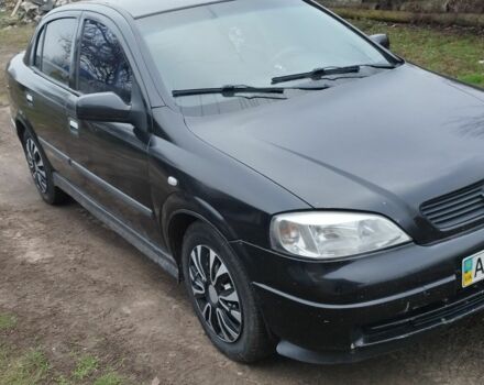 Черный Опель Астра, объемом двигателя 1.6 л и пробегом 200 тыс. км за 3700 $, фото 1 на Automoto.ua