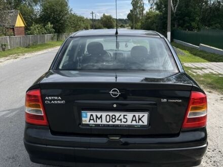 Черный Опель Астра, объемом двигателя 1.6 л и пробегом 283 тыс. км за 80000 $, фото 1 на Automoto.ua