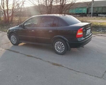 Чорний Опель Астра, об'ємом двигуна 1.4 л та пробігом 160 тис. км за 3100 $, фото 1 на Automoto.ua