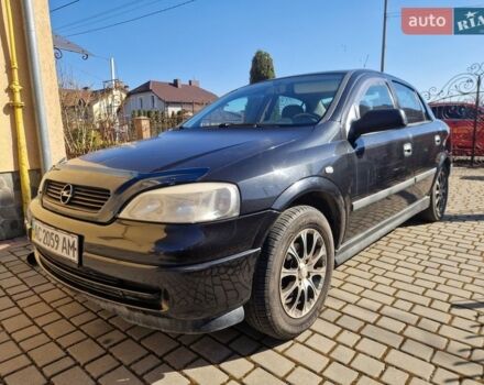 Черный Опель Астра, объемом двигателя 1.4 л и пробегом 266 тыс. км за 3200 $, фото 1 на Automoto.ua