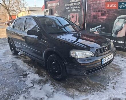 Черный Опель Астра, объемом двигателя 1.4 л и пробегом 200 тыс. км за 2650 $, фото 1 на Automoto.ua