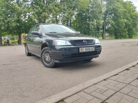 Черный Опель Астра, объемом двигателя 1.4 л и пробегом 140 тыс. км за 4600 $, фото 1 на Automoto.ua
