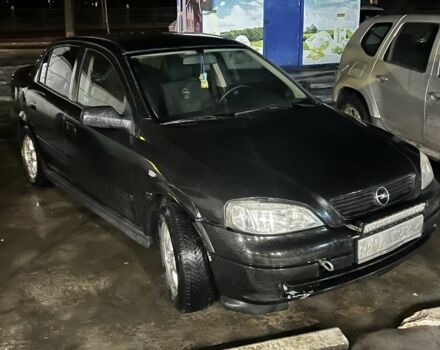 Черный Опель Астра, объемом двигателя 1.4 л и пробегом 130 тыс. км за 1400 $, фото 1 на Automoto.ua