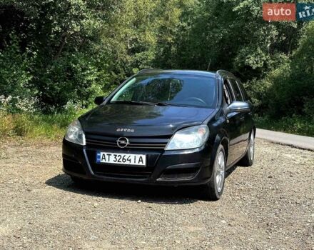 Черный Опель Астра, объемом двигателя 1.69 л и пробегом 206 тыс. км за 3250 $, фото 1 на Automoto.ua