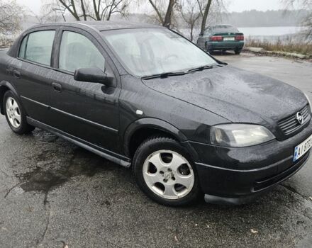 Черный Опель Астра, объемом двигателя 1.7 л и пробегом 250 тыс. км за 2999 $, фото 1 на Automoto.ua