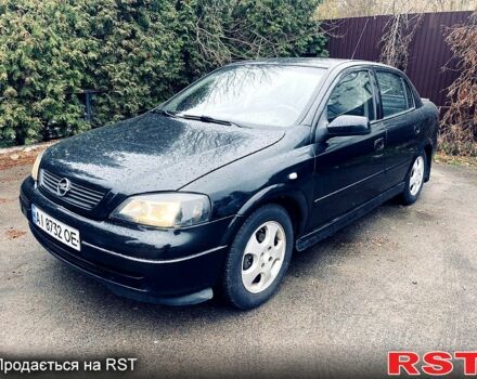 Черный Опель Астра, объемом двигателя 1.7 л и пробегом 298 тыс. км за 3400 $, фото 1 на Automoto.ua