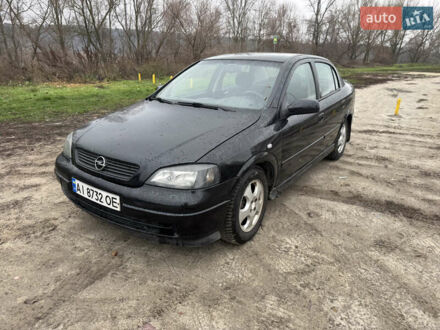 Черный Опель Астра, объемом двигателя 1.7 л и пробегом 300 тыс. км за 2999 $, фото 1 на Automoto.ua