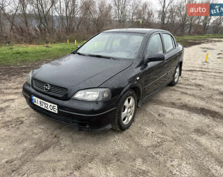 Черный Опель Астра, объемом двигателя 1.7 л и пробегом 300 тыс. км за 2999 $, фото 1 на Automoto.ua