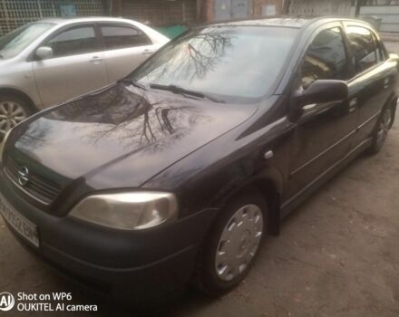 Черный Опель Астра, объемом двигателя 1.4 л и пробегом 180 тыс. км за 2100 $, фото 1 на Automoto.ua