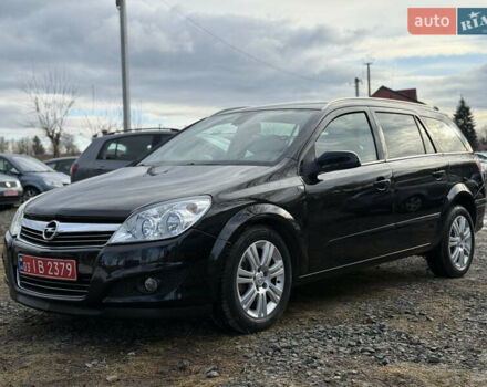 Черный Опель Астра, объемом двигателя 1.6 л и пробегом 203 тыс. км за 4999 $, фото 1 на Automoto.ua
