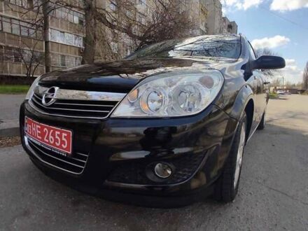 Черный Опель Астра, объемом двигателя 1.4 л и пробегом 241 тыс. км за 4750 $, фото 1 на Automoto.ua