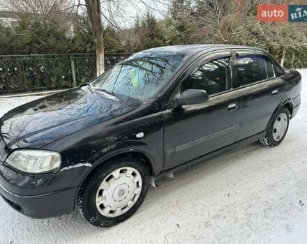 Черный Опель Астра, объемом двигателя 1.36 л и пробегом 320 тыс. км за 2800 $, фото 1 на Automoto.ua