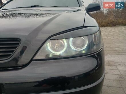 Черный Опель Астра, объемом двигателя 1.4 л и пробегом 222 тыс. км за 3400 $, фото 1 на Automoto.ua