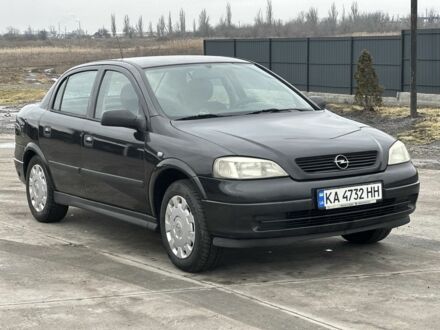 Черный Опель Астра, объемом двигателя 1.4 л и пробегом 260 тыс. км за 3600 $, фото 1 на Automoto.ua