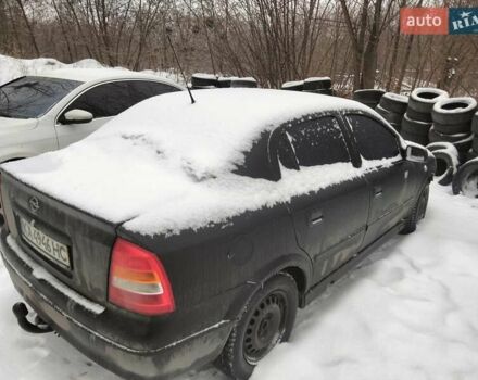 Черный Опель Астра, объемом двигателя 1.39 л и пробегом 452 тыс. км за 1800 $, фото 1 на Automoto.ua