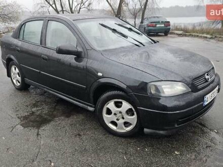 Черный Опель Астра, объемом двигателя 1.7 л и пробегом 260 тыс. км за 2900 $, фото 1 на Automoto.ua