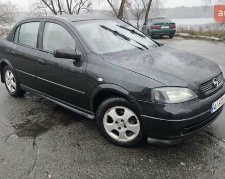 Черный Опель Астра, объемом двигателя 1.7 л и пробегом 260 тыс. км за 2900 $, фото 1 на Automoto.ua