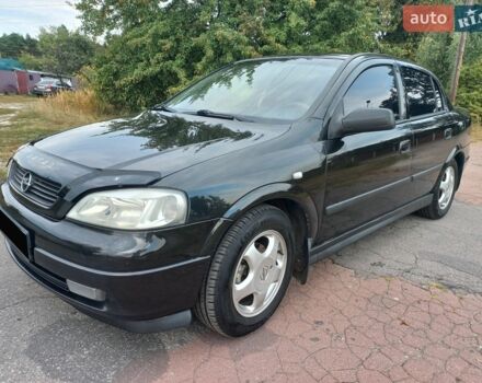 Черный Опель Астра, объемом двигателя 1.6 л и пробегом 230 тыс. км за 4200 $, фото 1 на Automoto.ua