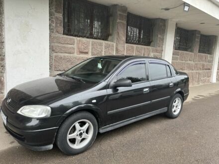 Черный Опель Астра, объемом двигателя 1.6 л и пробегом 240 тыс. км за 4500 $, фото 1 на Automoto.ua