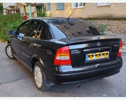 Черный Опель Астра, объемом двигателя 1.4 л и пробегом 176 тыс. км за 3850 $, фото 1 на Automoto.ua