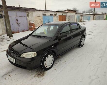 Черный Опель Астра, объемом двигателя 1.36 л и пробегом 300 тыс. км за 2150 $, фото 1 на Automoto.ua