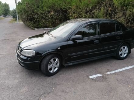 Чорний Опель Астра, об'ємом двигуна 1.4 л та пробігом 260 тис. км за 3111 $, фото 1 на Automoto.ua