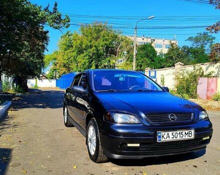 Черный Опель Астра, объемом двигателя 1.4 л и пробегом 141 тыс. км за 3500 $, фото 1 на Automoto.ua