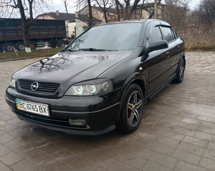 Черный Опель Астра, объемом двигателя 1.4 л и пробегом 222 тыс. км за 3400 $, фото 1 на Automoto.ua