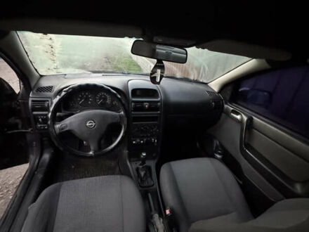 Черный Опель Астра, объемом двигателя 1.6 л и пробегом 240 тыс. км за 2500 $, фото 1 на Automoto.ua