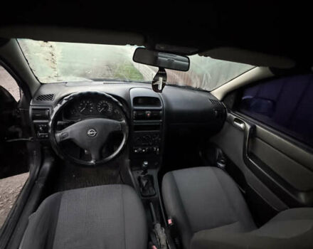 Черный Опель Астра, объемом двигателя 1.6 л и пробегом 240 тыс. км за 2500 $, фото 1 на Automoto.ua