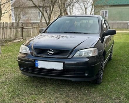 Черный Опель Астра, объемом двигателя 1.4 л и пробегом 175 тыс. км за 2729 $, фото 1 на Automoto.ua