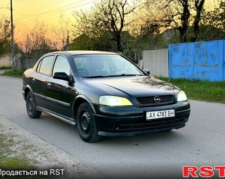 Черный Опель Астра, объемом двигателя 1.6 л и пробегом 166 тыс. км за 2000 $, фото 1 на Automoto.ua