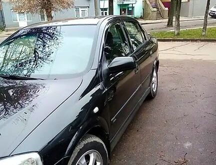 Черный Опель Астра, объемом двигателя 1.4 л и пробегом 155 тыс. км за 3500 $, фото 1 на Automoto.ua