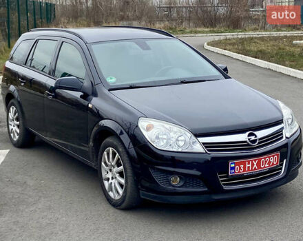 Черный Опель Астра, объемом двигателя 1.8 л и пробегом 200 тыс. км за 6999 $, фото 1 на Automoto.ua