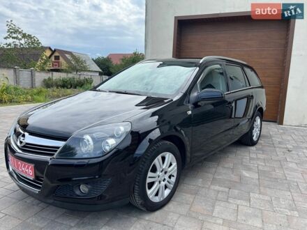 Черный Опель Астра, объемом двигателя 1.6 л и пробегом 220 тыс. км за 5900 $, фото 1 на Automoto.ua