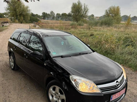 Черный Опель Астра, объемом двигателя 1.6 л и пробегом 230 тыс. км за 5750 $, фото 1 на Automoto.ua