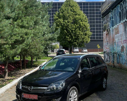 Черный Опель Астра, объемом двигателя 1.6 л и пробегом 180 тыс. км за 5150 $, фото 1 на Automoto.ua