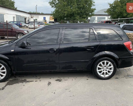 Черный Опель Астра, объемом двигателя 1.6 л и пробегом 242 тыс. км за 5800 $, фото 1 на Automoto.ua