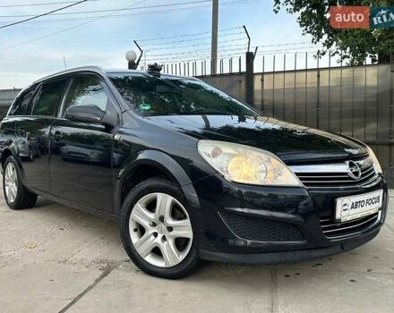 Черный Опель Астра, объемом двигателя 1.6 л и пробегом 282 тыс. км за 5990 $, фото 1 на Automoto.ua