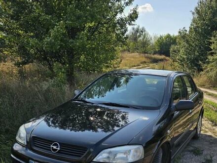 Черный Опель Астра, объемом двигателя 1.38 л и пробегом 144 тыс. км за 4600 $, фото 1 на Automoto.ua