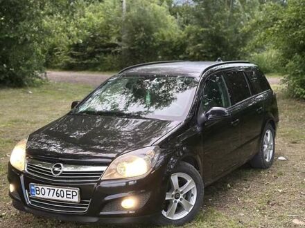 Черный Опель Астра, объемом двигателя 1.69 л и пробегом 250 тыс. км за 6500 $, фото 1 на Automoto.ua