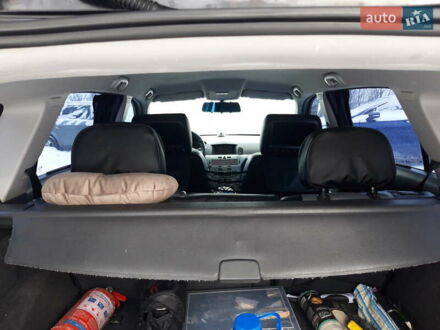 Черный Опель Астра, объемом двигателя 1.7 л и пробегом 321 тыс. км за 5500 $, фото 1 на Automoto.ua