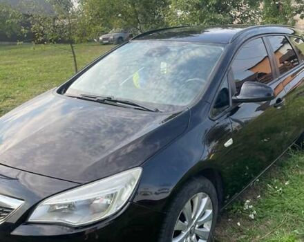 Черный Опель Астра, объемом двигателя 1.4 л и пробегом 249 тыс. км за 5950 $, фото 1 на Automoto.ua
