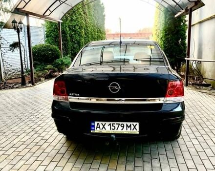 Черный Опель Астра, объемом двигателя 1.6 л и пробегом 230 тыс. км за 6895 $, фото 1 на Automoto.ua