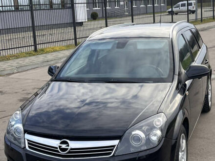Черный Опель Астра, объемом двигателя 1.7 л и пробегом 230 тыс. км за 5650 $, фото 1 на Automoto.ua