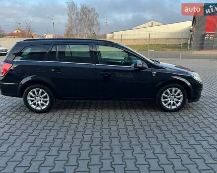 Черный Опель Астра, объемом двигателя 1.6 л и пробегом 219 тыс. км за 5600 $, фото 1 на Automoto.ua