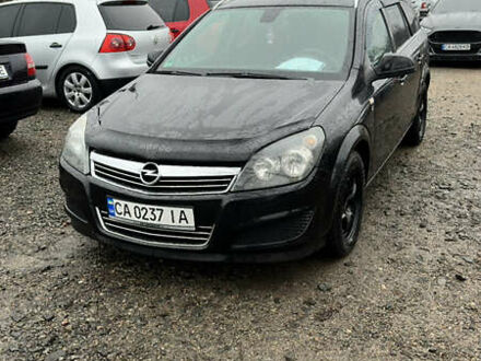 Черный Опель Астра, объемом двигателя 1.69 л и пробегом 242 тыс. км за 6200 $, фото 1 на Automoto.ua