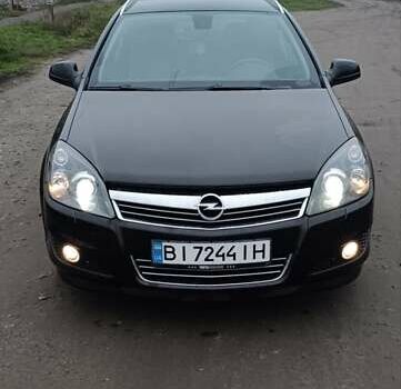 Черный Опель Астра, объемом двигателя 1.69 л и пробегом 246 тыс. км за 6500 $, фото 1 на Automoto.ua